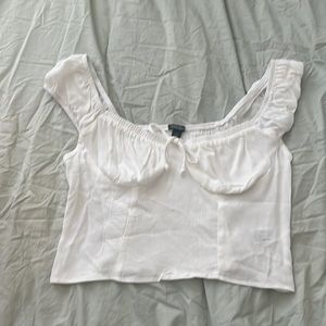 White scoop neck shirt